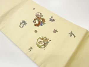 花輪に人形・草花模様刺繍名古屋帯